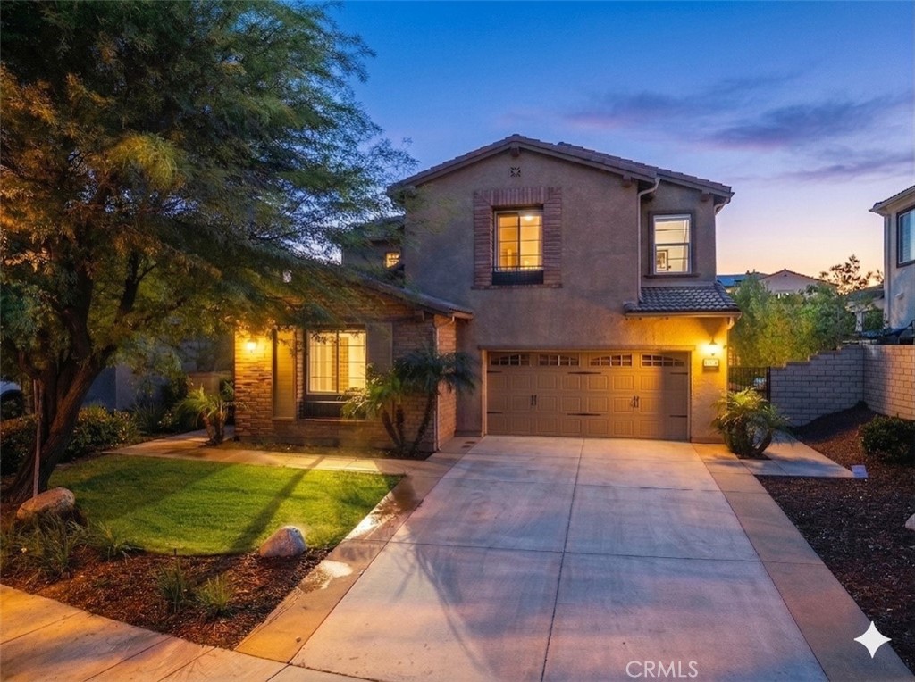 28613 Stonegate Court Valencia, CA 91354 - Photo 1 of 56 a front view of a house with a yard