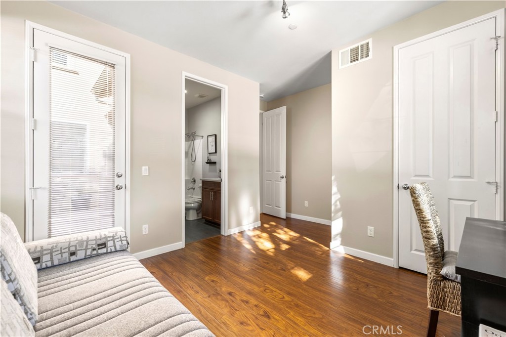 28613 Stonegate Court Valencia, CA 91354 - Photo 20 of 56 a view of a room with wooden floor and windows
