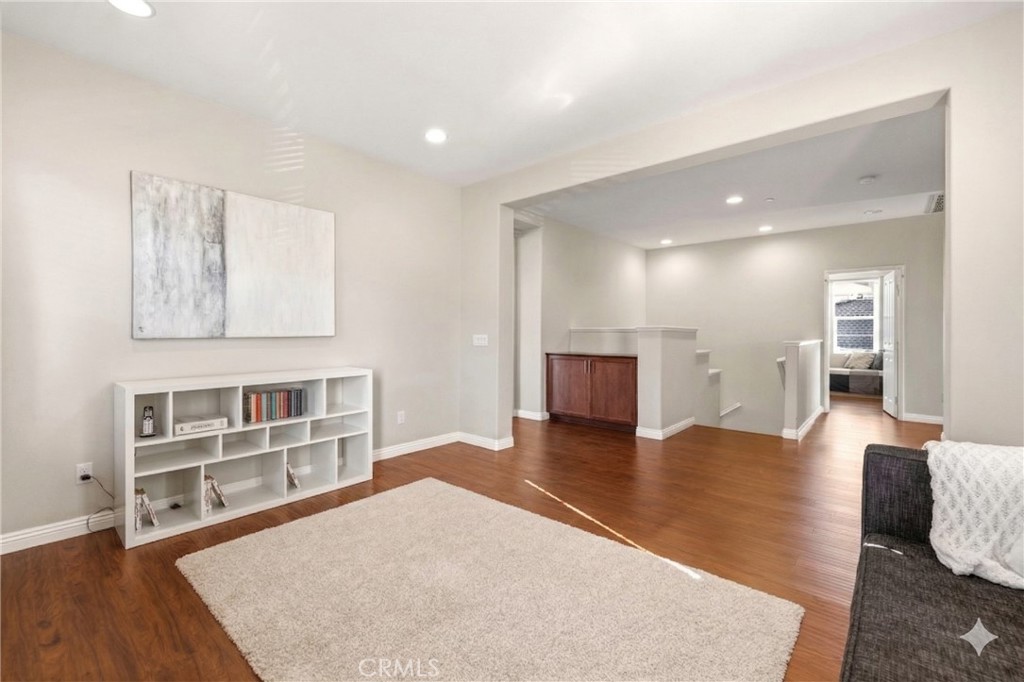 28613 Stonegate Court Valencia, CA 91354 - Photo 22 of 56 a living room with furniture and a wooden floor