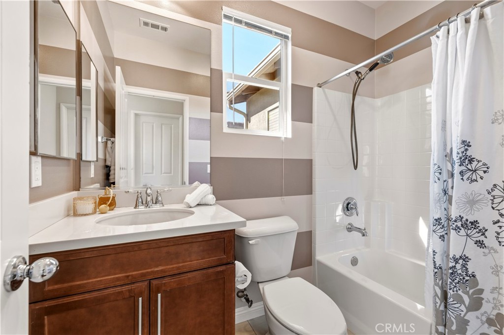 28613 Stonegate Court Valencia, CA 91354 - Photo 32 of 56 a bathroom with a sink toilet and shower