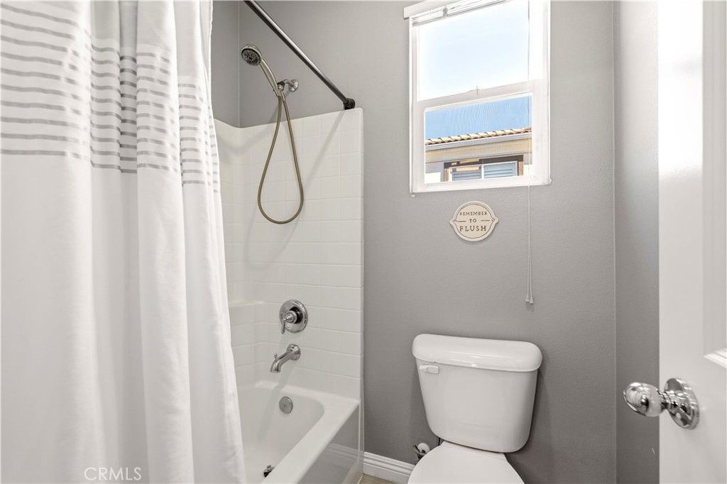 28613 Stonegate Court Valencia, CA 91354 - Photo 35 of 56 a bathroom with a toilet and a shower