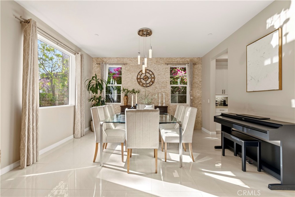28613 Stonegate Court Valencia, CA 91354 - Photo 7 of 56 a view of a dining room with furniture window and outside view
