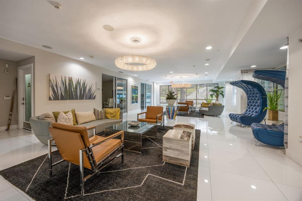 1900 Barton Springs Road, Unit 3013 Austin, TX 78704 - Photo 19 of 27 Enter a grand foyer featuring high ceilings and sleek tile flooring, ideal for a welcoming lounge.
