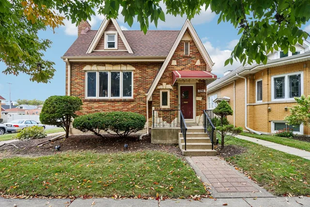 front view of a house with a yard