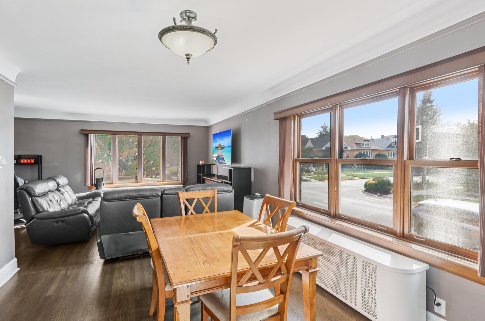 2246 Clinton Avenue Berwyn, IL 60402 - Photo 4 of 20 a living room with furniture and a large window