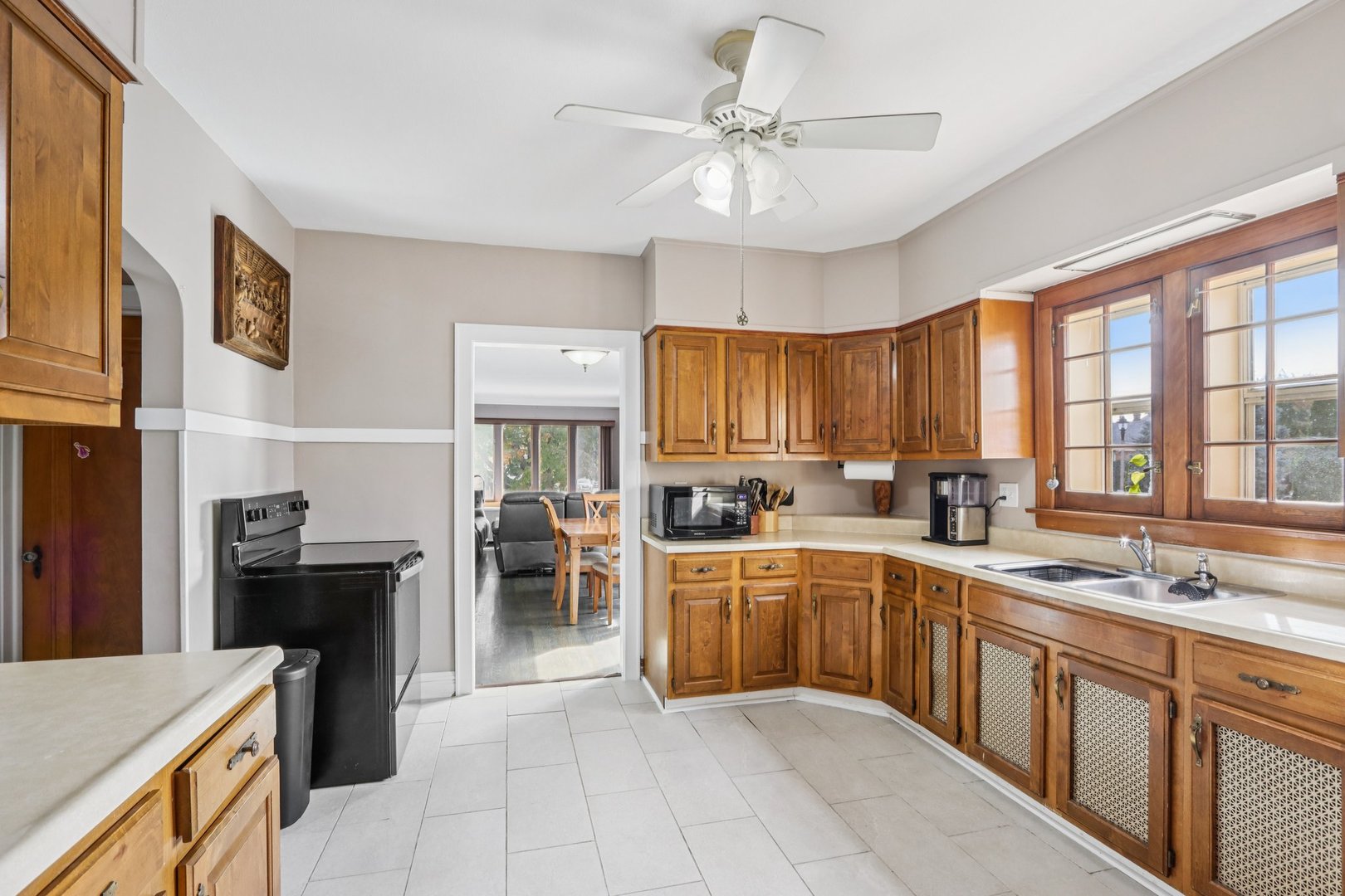 2246 Clinton Avenue Berwyn, IL 60402 - Photo 7 of 20 a large kitchen with a large counter top space appliances and cabinets