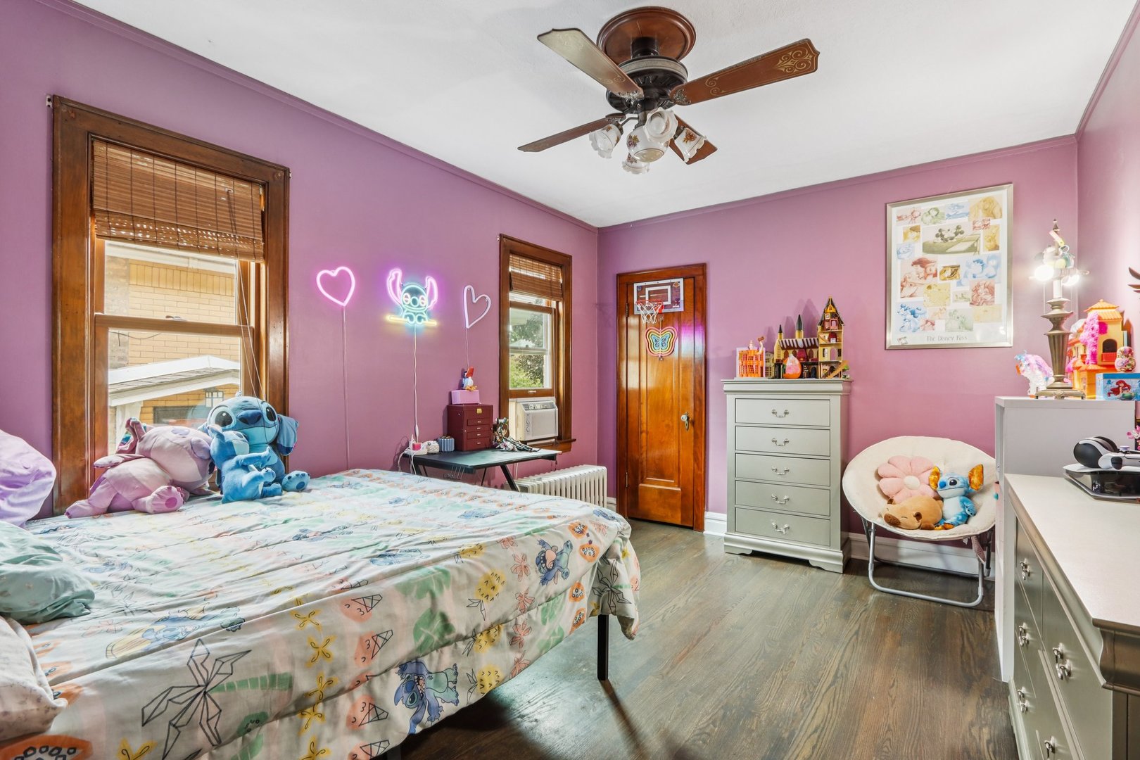 2246 Clinton Avenue Berwyn, IL 60402 - Photo 8 of 20 a bedroom with a bed a chandelier and a closet