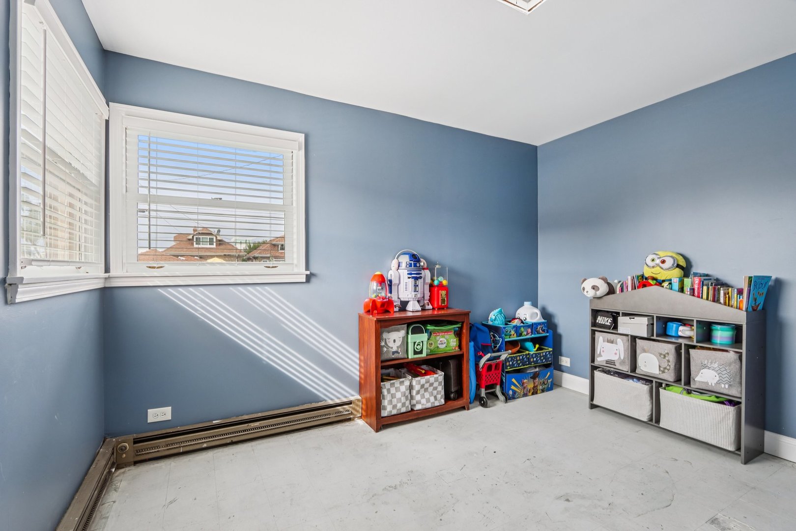 2246 Clinton Avenue Berwyn, IL 60402 - Photo 10 of 20 a children room with toys and a window
