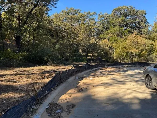 a view of swimming pool with a yard