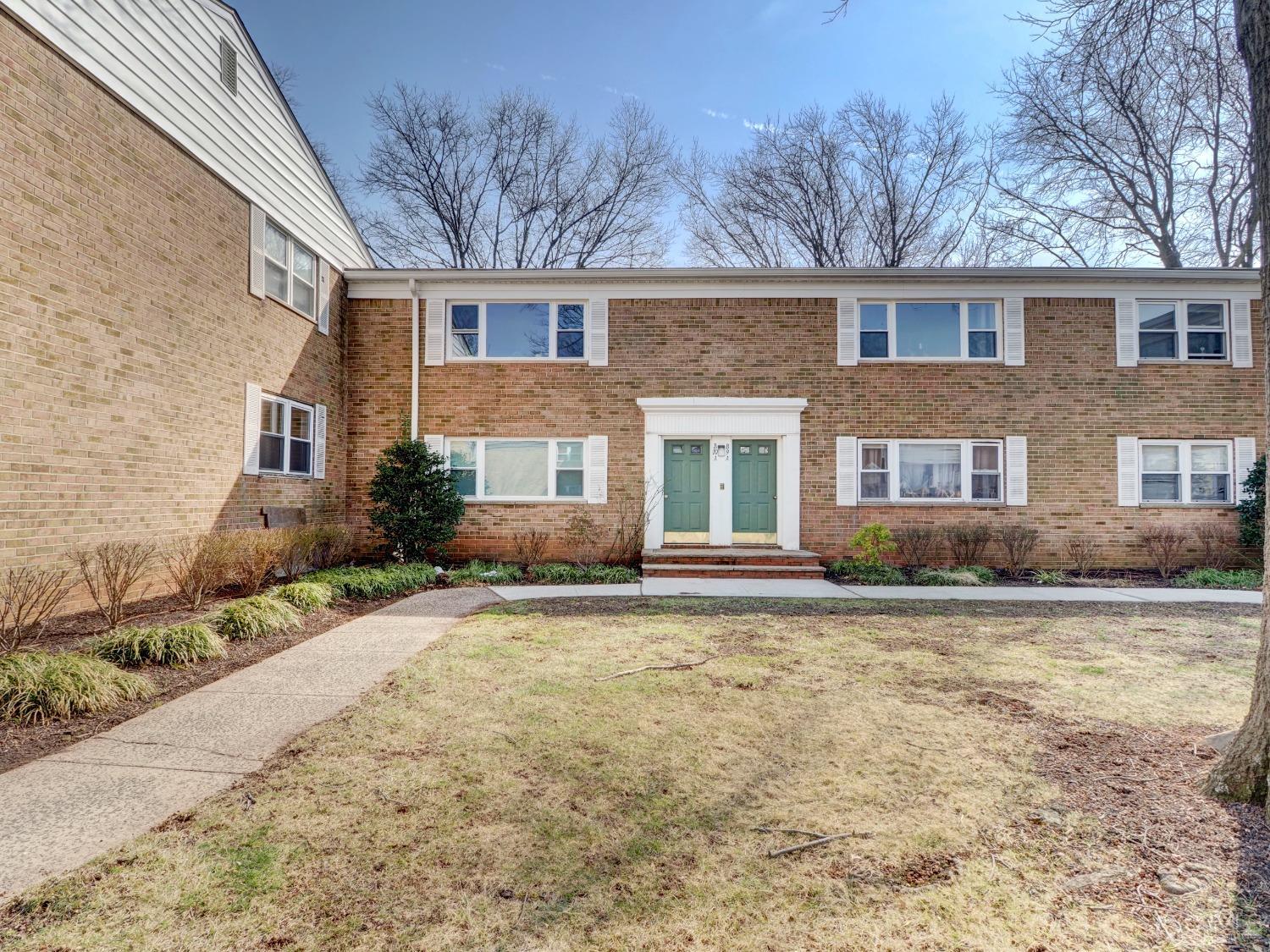 57 Judson Street, Unit 10B Edison, NJ 08837 - Photo 1 of 25 a front view of a house with a garden