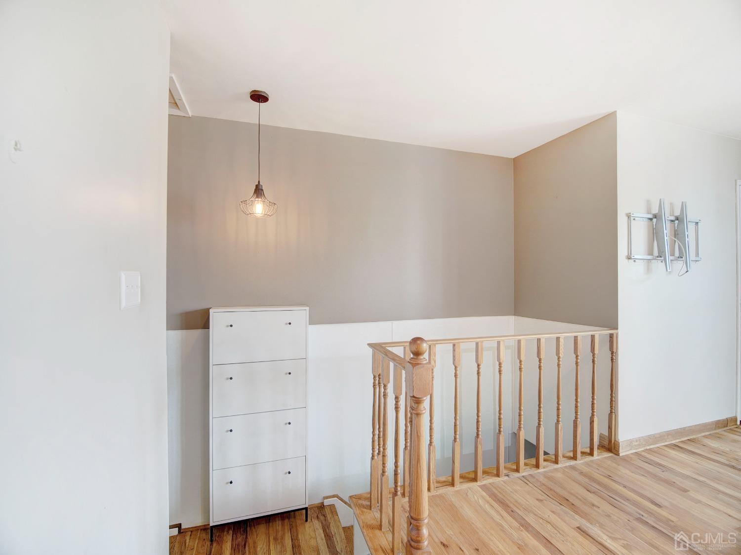 57 Judson Street, Unit 10B Edison, NJ 08837 - Photo 20 of 25 a view of a room with wooden floor