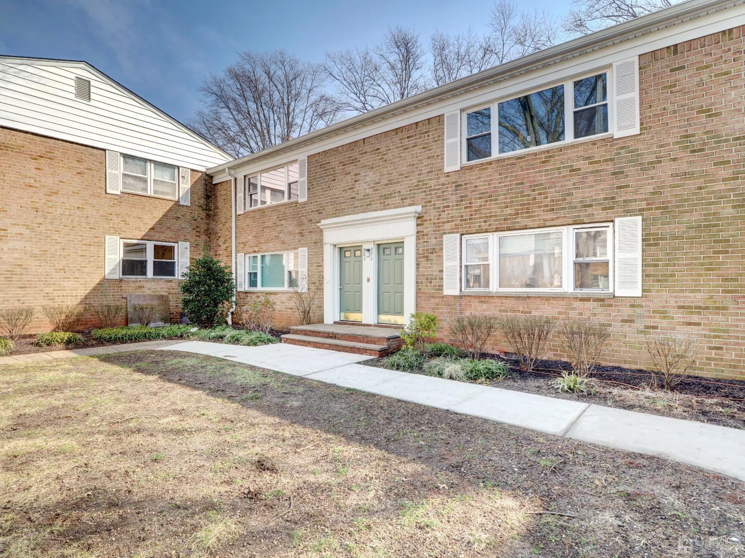 57 Judson Street, Unit 10B Edison, NJ 08837 - Photo 2 of 25 a front view of a house with a yard
