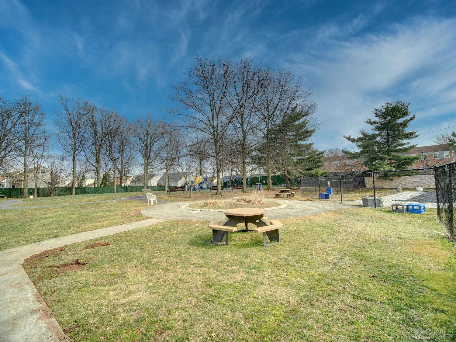 57 Judson Street, Unit 10B Edison, NJ 08837 - Photo 23 of 25 a swimming pool with outdoor seating and yard