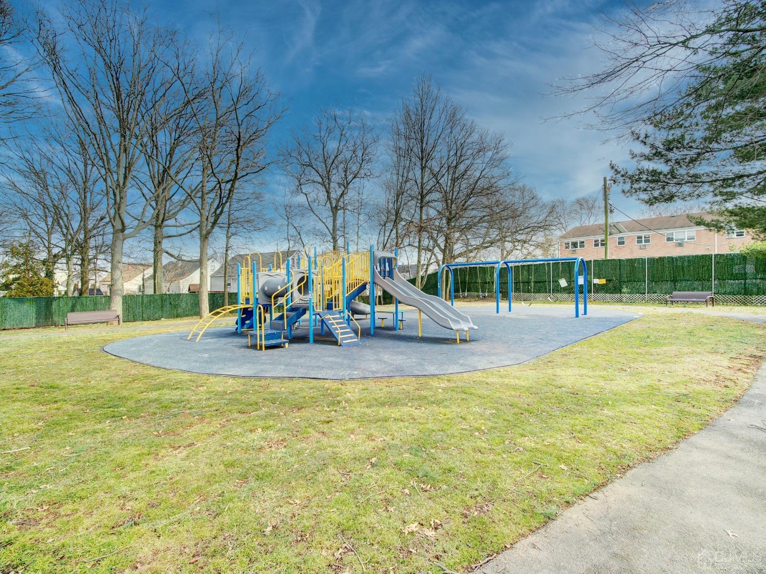 57 Judson Street, Unit 10B Edison, NJ 08837 - Photo 24 of 25 a view of a swimming pool with a bench