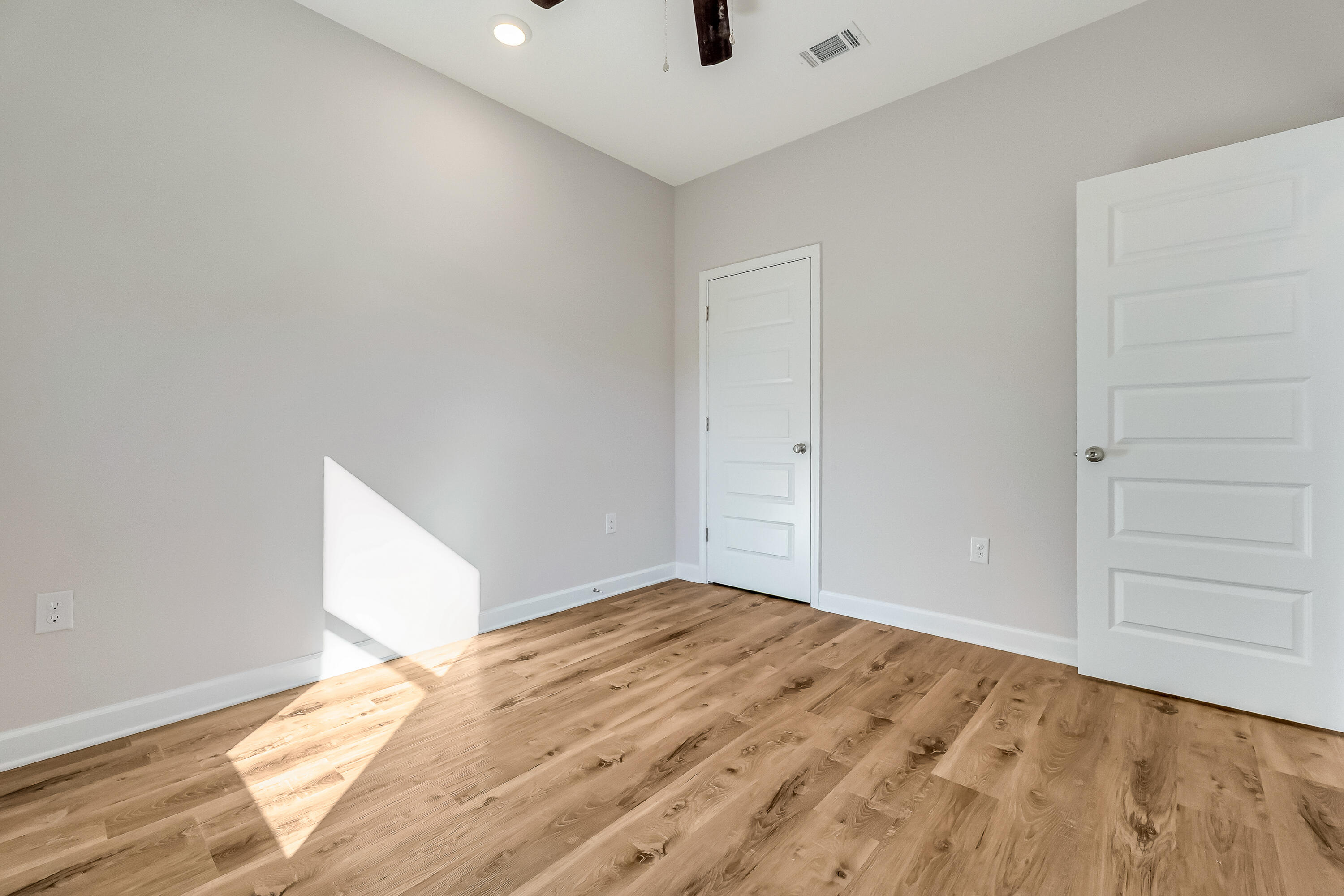 593 Brock Avenue Crestview, FL 32539 - Photo 15 of 19 wooden floor in an empty room