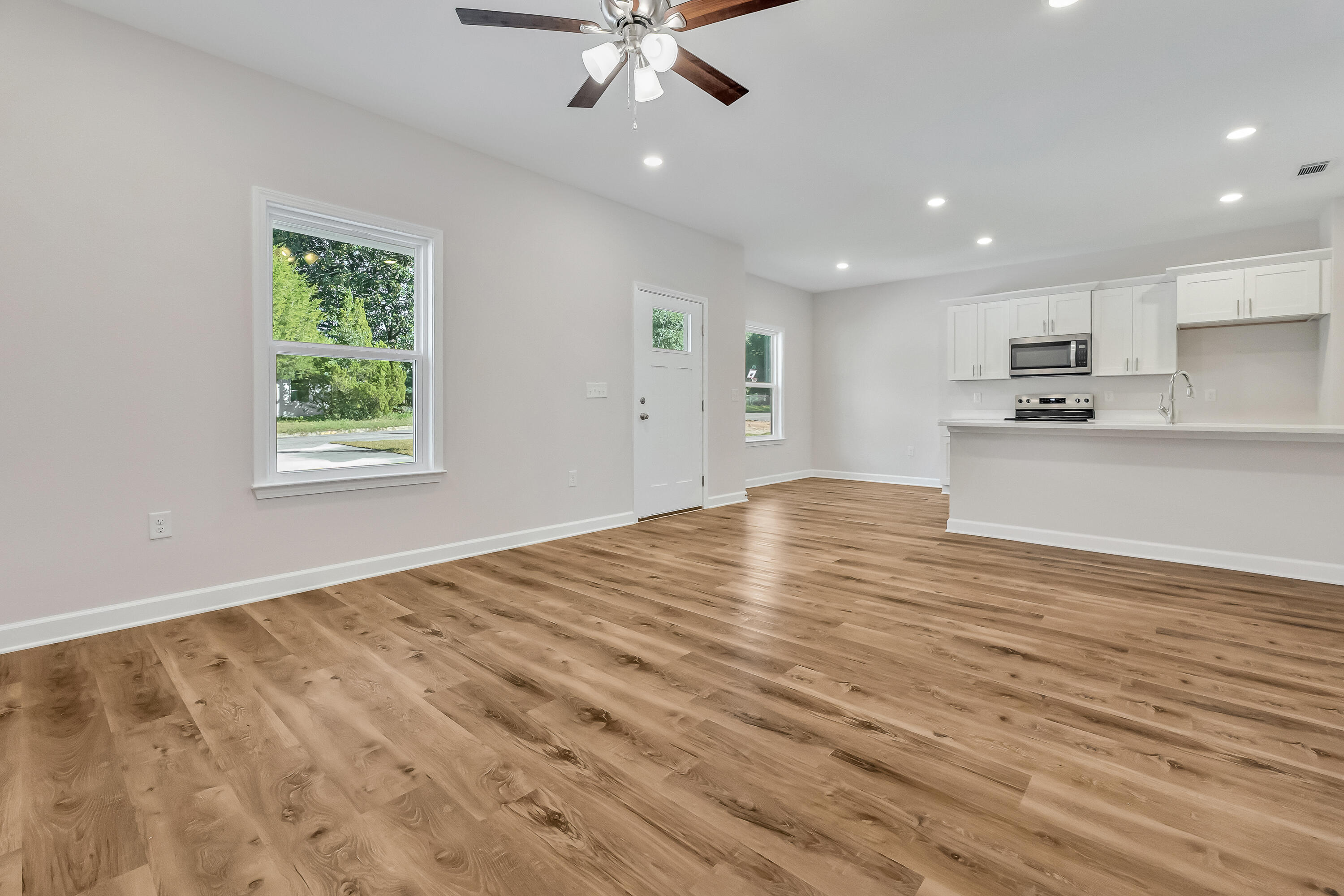 593 Brock Avenue Crestview, FL 32539 - Photo 5 of 19 a view of a kitchen with microwave and cabinets
