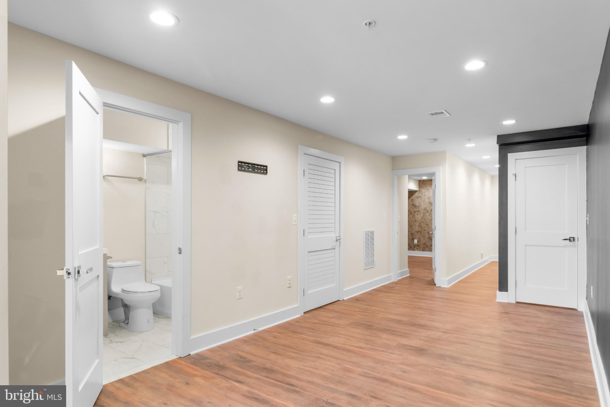 2405 Naylor Road Southeast Washington, DC 20020 - Photo 15 of 20 Spacious hallway with modern finishes.