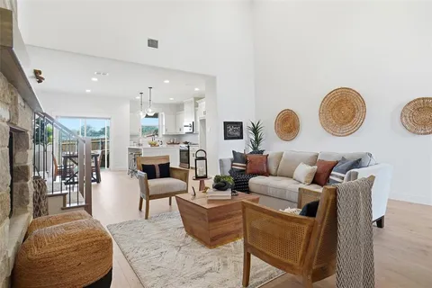 a living room with furniture kitchen view and living room