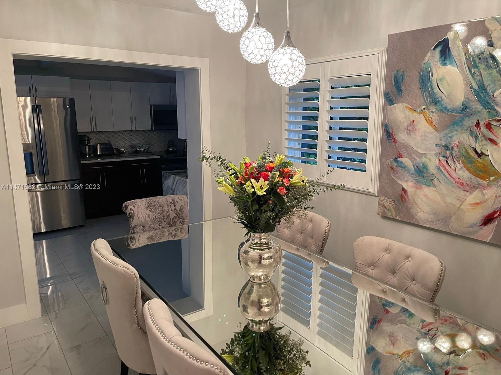 200 Southwest 30th Avenue Miami, FL 33135 - Photo 12 of 20 a dining room with furniture