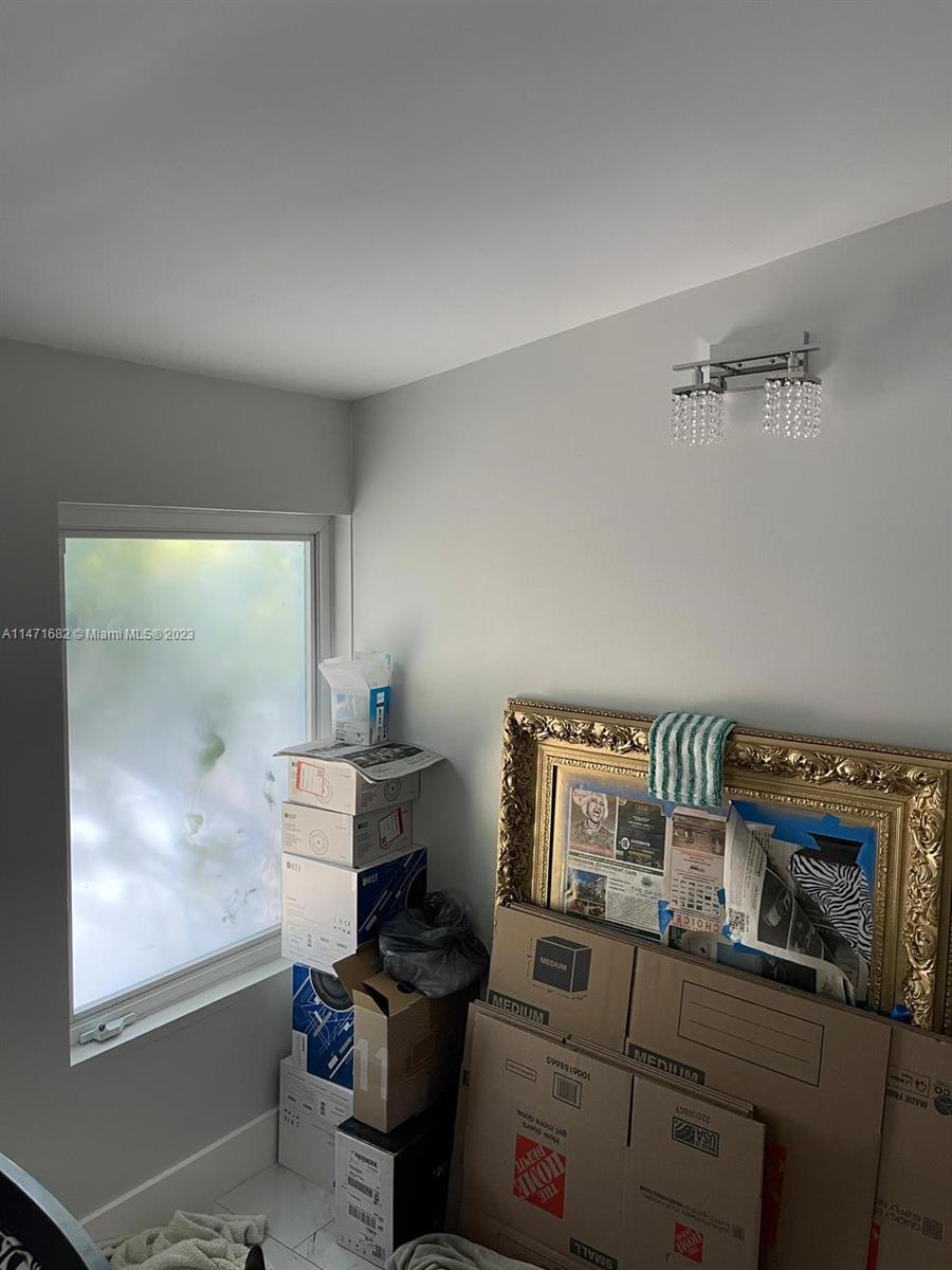 200 Southwest 30th Avenue Miami, FL 33135 - Photo 14 of 20 a room with storage and utility