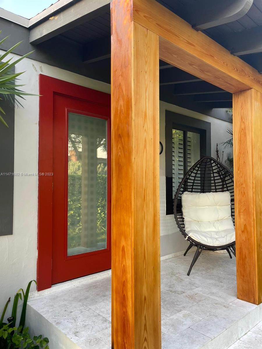 200 Southwest 30th Avenue Miami, FL 33135 - Photo 7 of 20 a view of a outdoor space with a door and windows