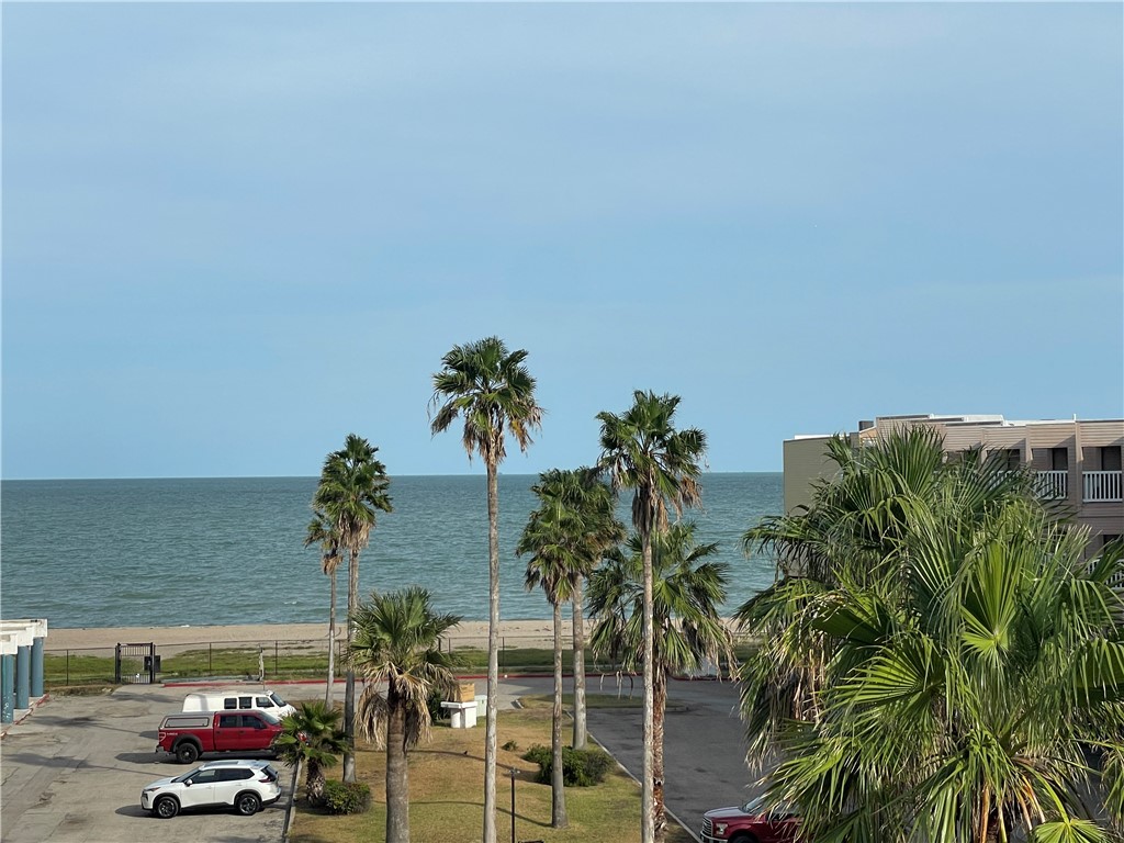 3938 Surfside Boulevard, Unit 3344 Corpus Christi, TX 78402 - Photo 26 of 34 a couple of cars parked in front of building