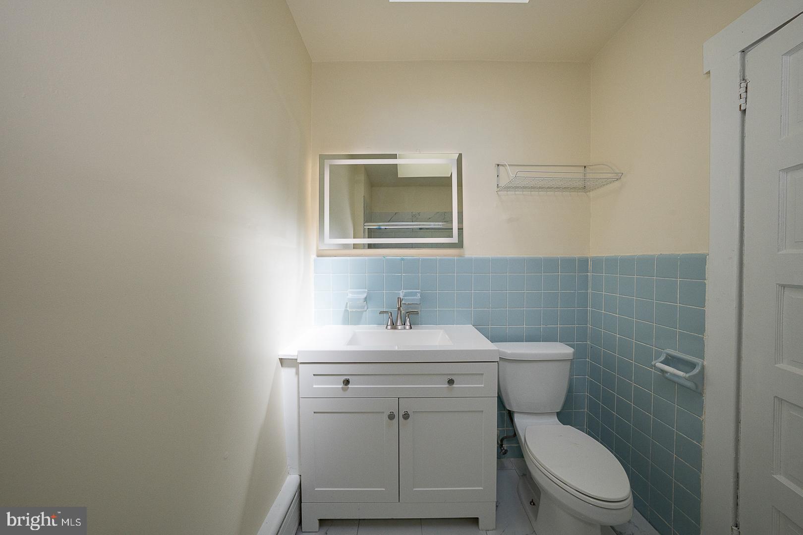 1 South Valley Road, Unit 201 Paoli, PA 19301 - Photo 14 of 26 Updated Full Hall Bathroom