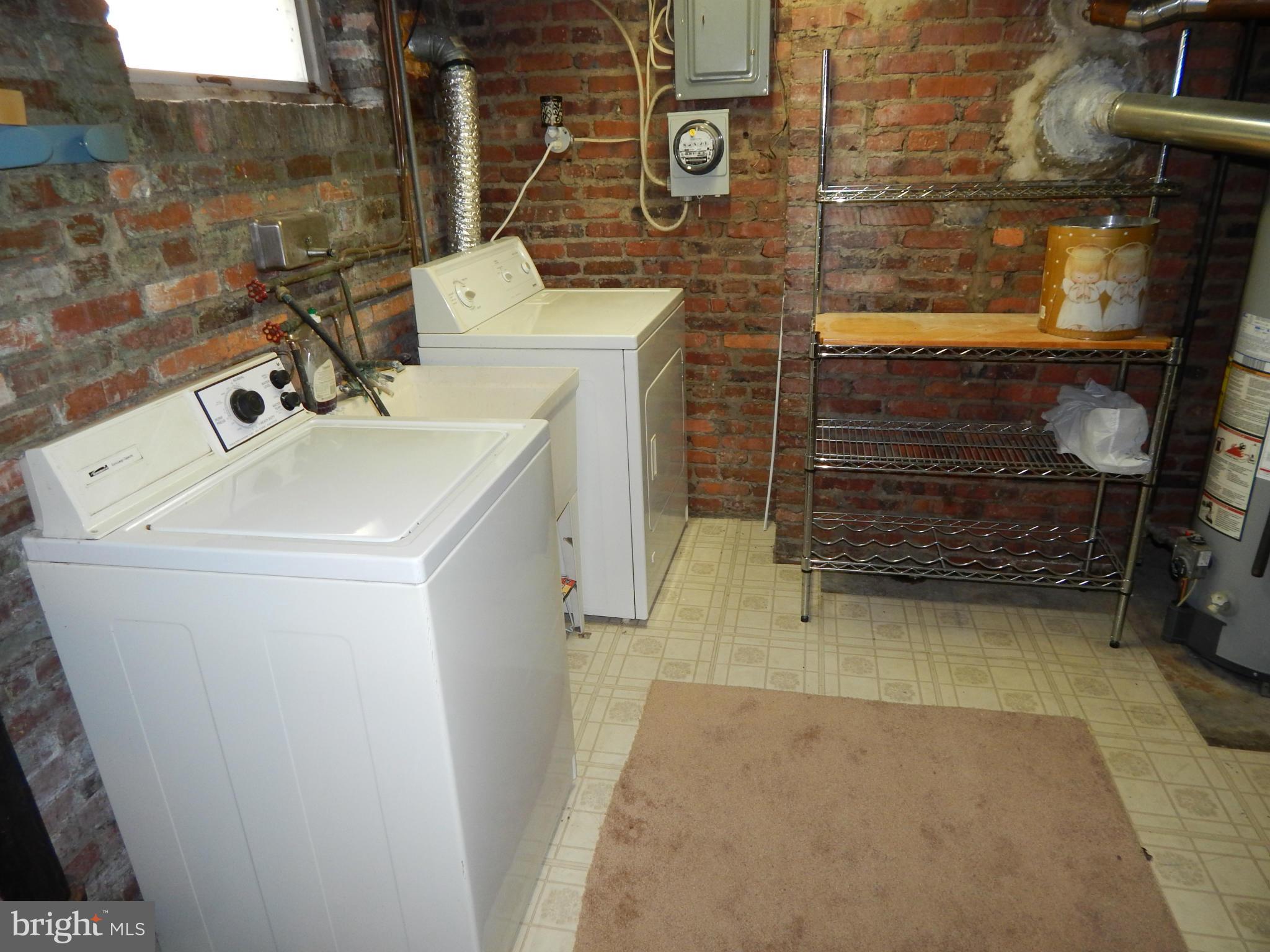 25 Kinship Road Dundalk, MD 21222 - Photo 22 of 30 a utility room with dryer and washer