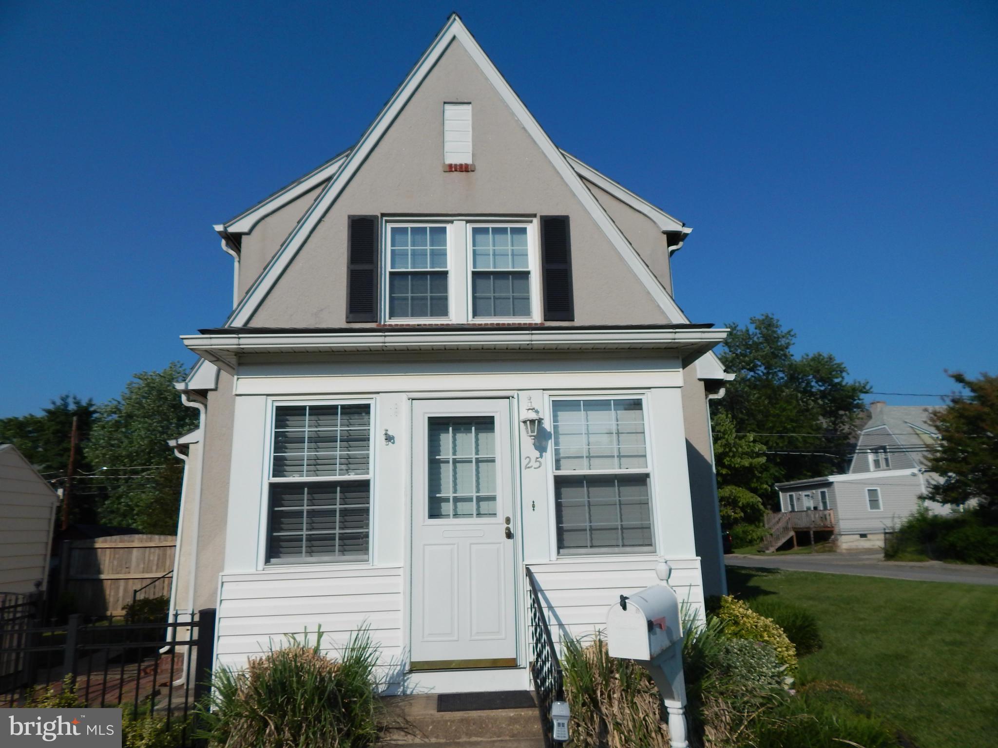 25 Kinship Road Dundalk, MD 21222 - Photo 29 of 30 a front view of a house with a yard