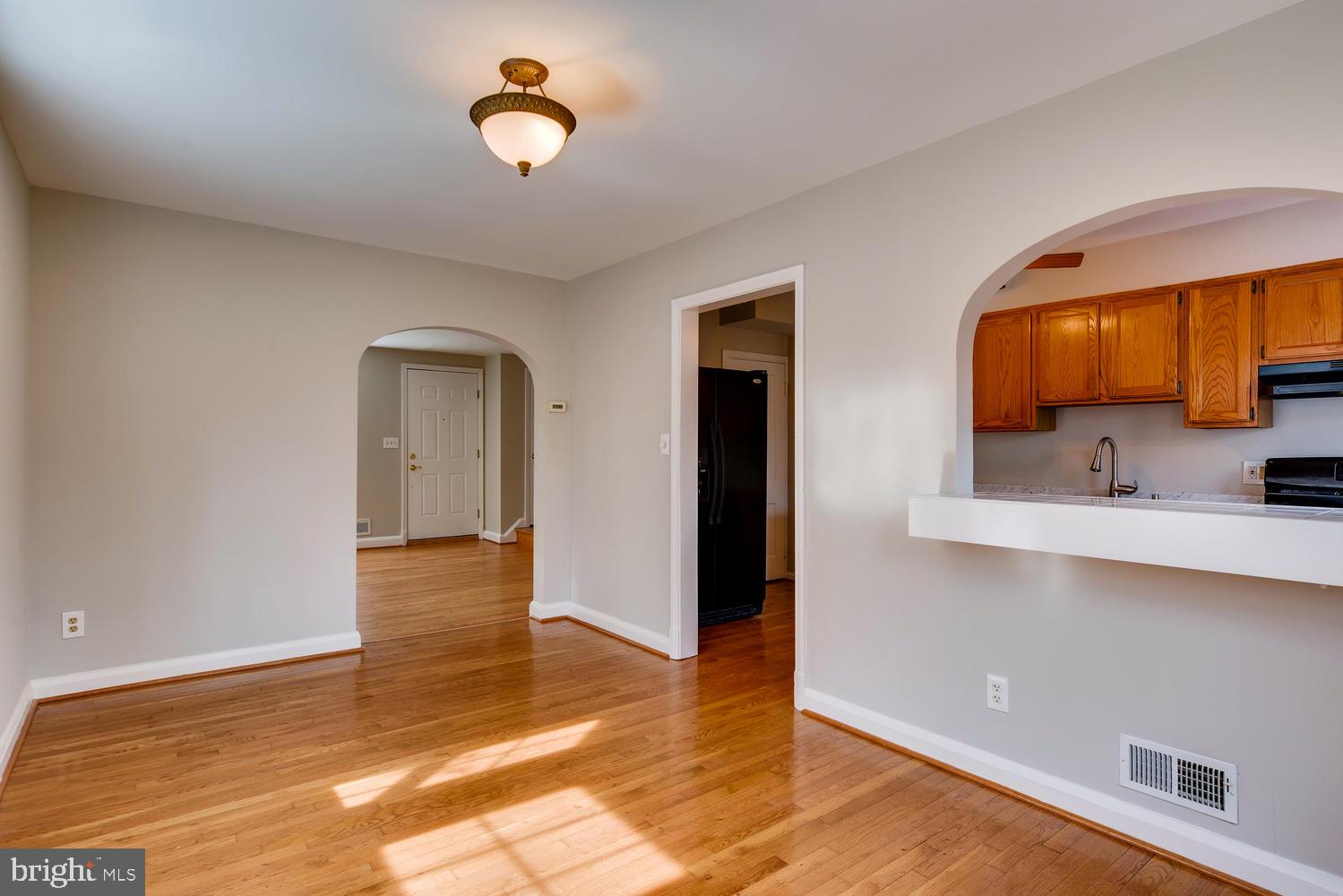 1618 Hardwick Road Baltimore, MD 21286 - Photo 8 of 27 a view of a room with wooden floor and cabinet