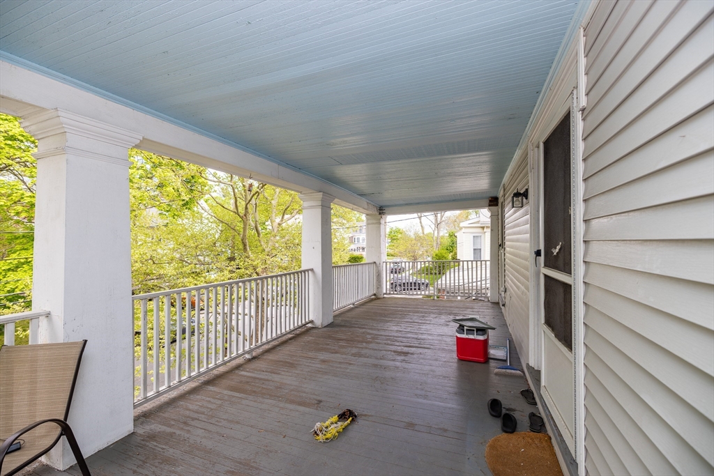 84 Walker Street, Unit 2 Newton, MA 02460 - Photo 18 of 18 a view of a porch with wooden floor and outdoor space