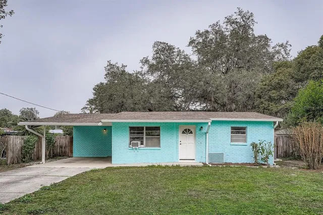 front view of a house with a yard
