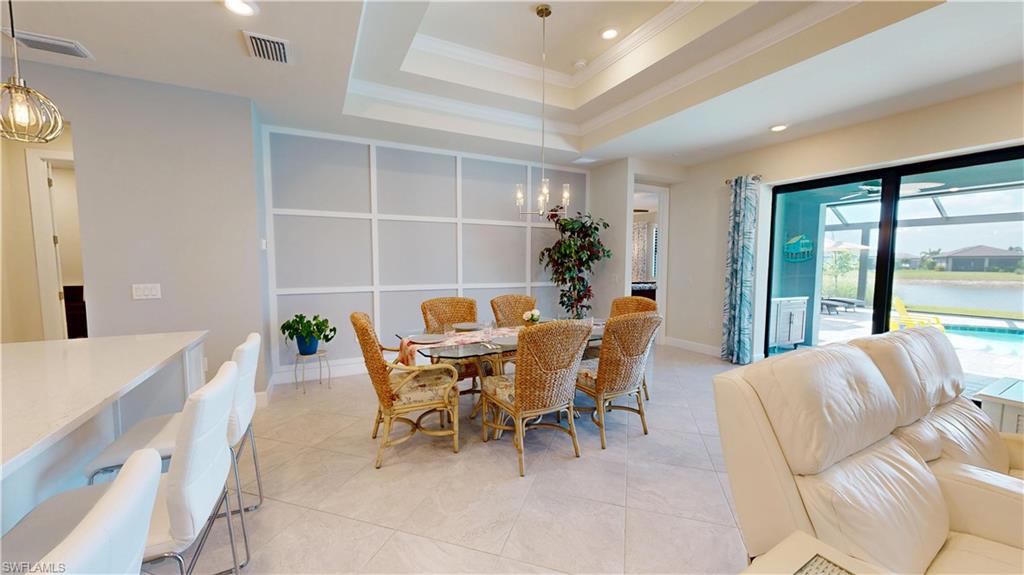 6162 Nobility Way Avenue Immokalee, FL 34142 - Photo 12 of 50 a living room with furniture and a large window