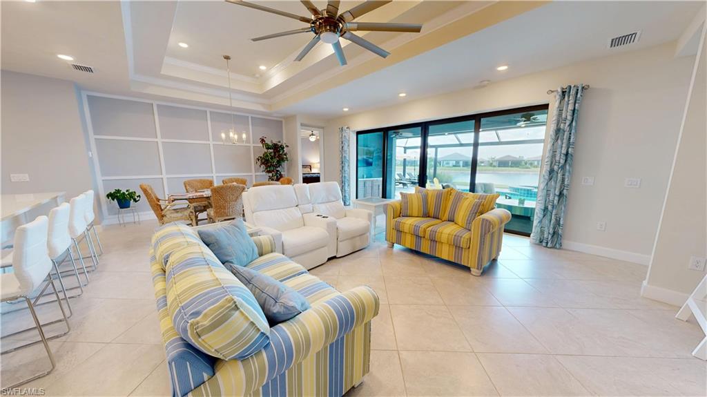 6162 Nobility Way Avenue Immokalee, FL 34142 - Photo 17 of 50 a living room with furniture and a large window