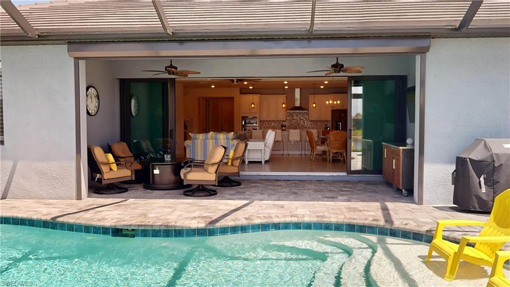 6162 Nobility Way Avenue Immokalee, FL 34142 - Photo 25 of 50 a view of a house with backyard porch and sitting area