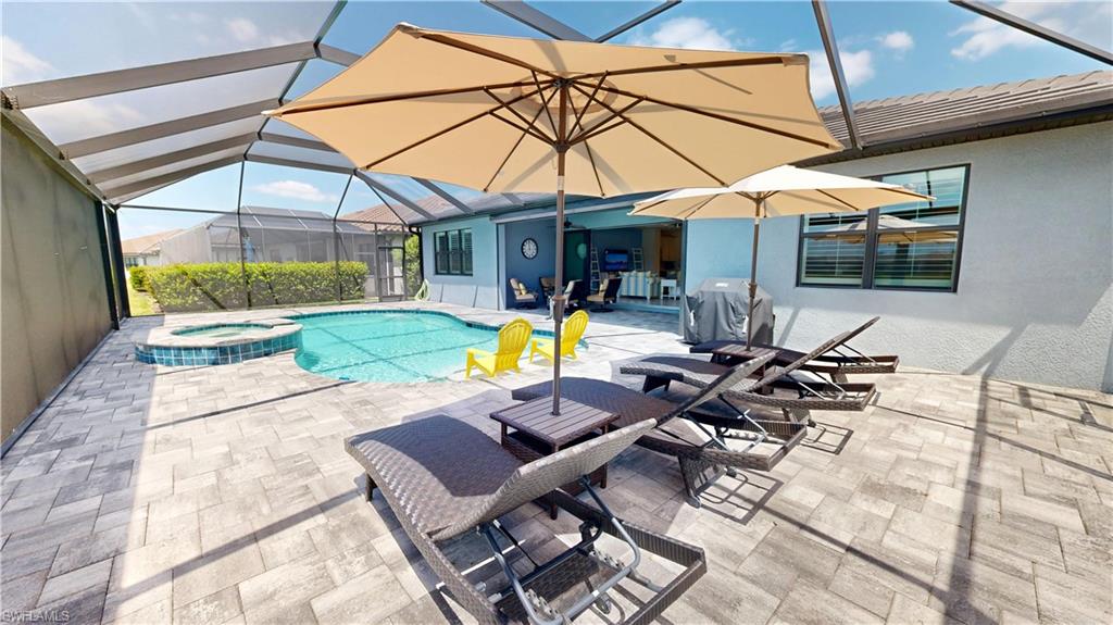 6162 Nobility Way Avenue Immokalee, FL 34142 - Photo 27 of 50 a view of a swimming pool with a patio