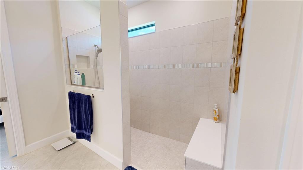 6162 Nobility Way Avenue Immokalee, FL 34142 - Photo 36 of 50 a bathroom with a sink and a mirror