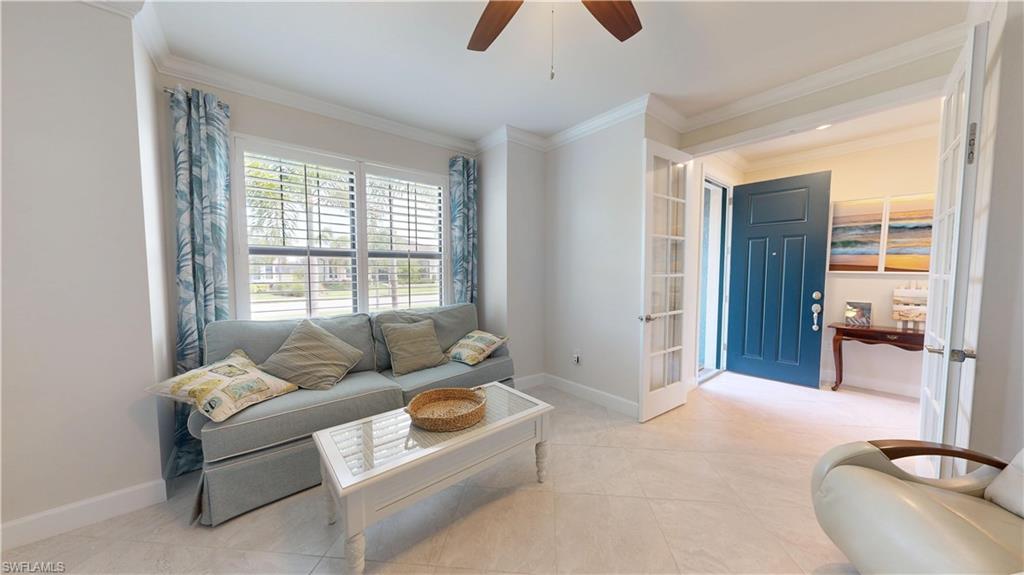 6162 Nobility Way Avenue Immokalee, FL 34142 - Photo 43 of 50 a living room with furniture and a window