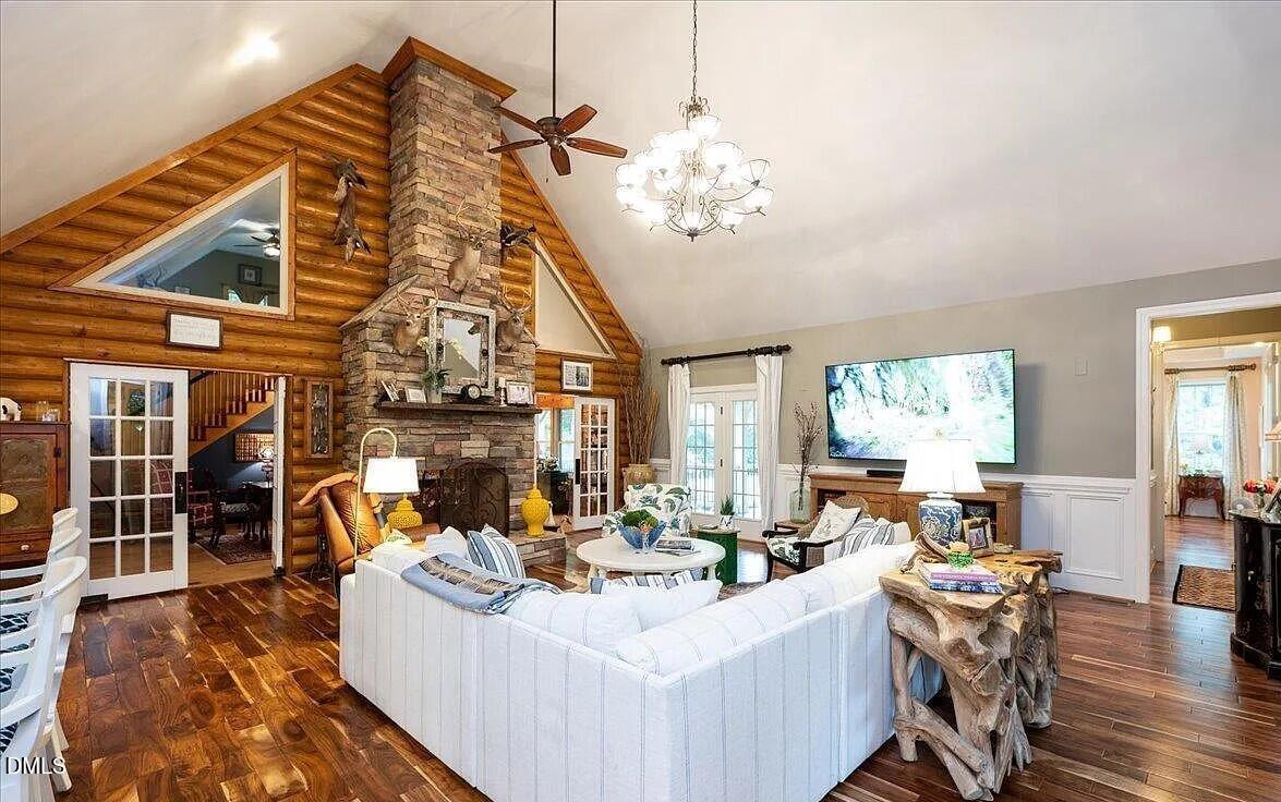 413 Johnson Town Road Zebulon, NC 27597 - Photo 2 of 42 a view of a dining room with furniture window and outside view