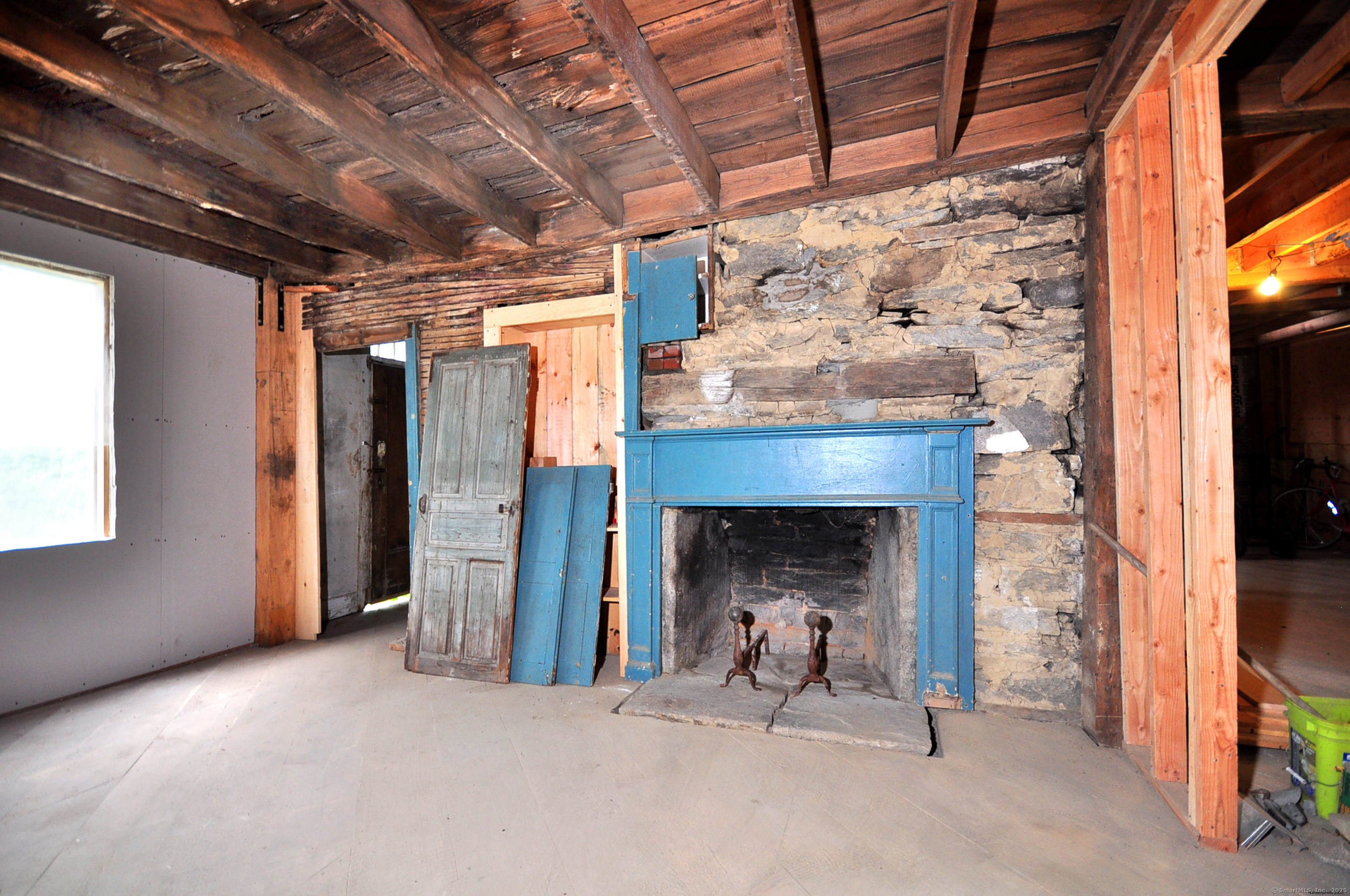 30 Chestnut Hill Road Killingworth, CT 06419 - Photo 20 of 38 a view of an empty room with a fireplace