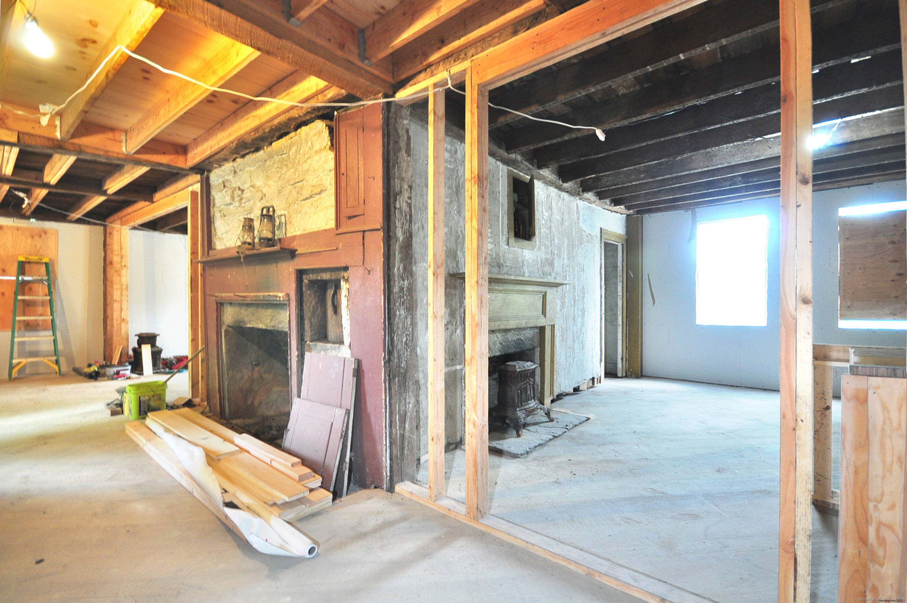 30 Chestnut Hill Road Killingworth, CT 06419 - Photo 23 of 38 a view of an empty room with a fireplace
