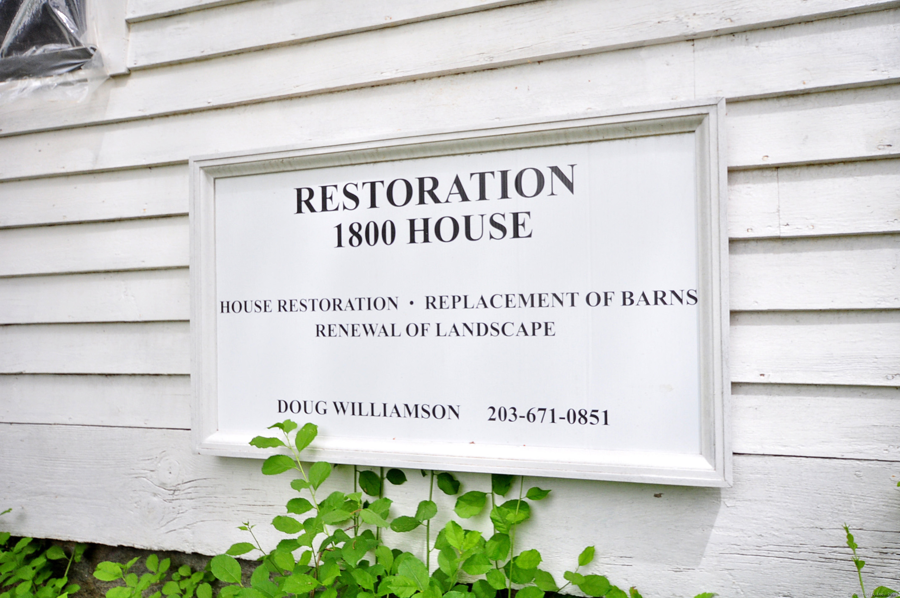 30 Chestnut Hill Road Killingworth, CT 06419 - Photo 4 of 38 a sign on the wall