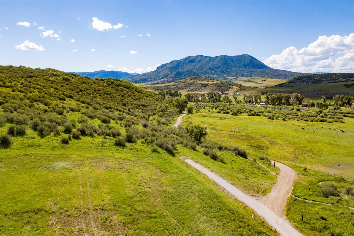 26705 Wild Iris Path Steamboat Springs, CO 80487 - Photo 5 of 17 a view of an swimming pool and mountain view
