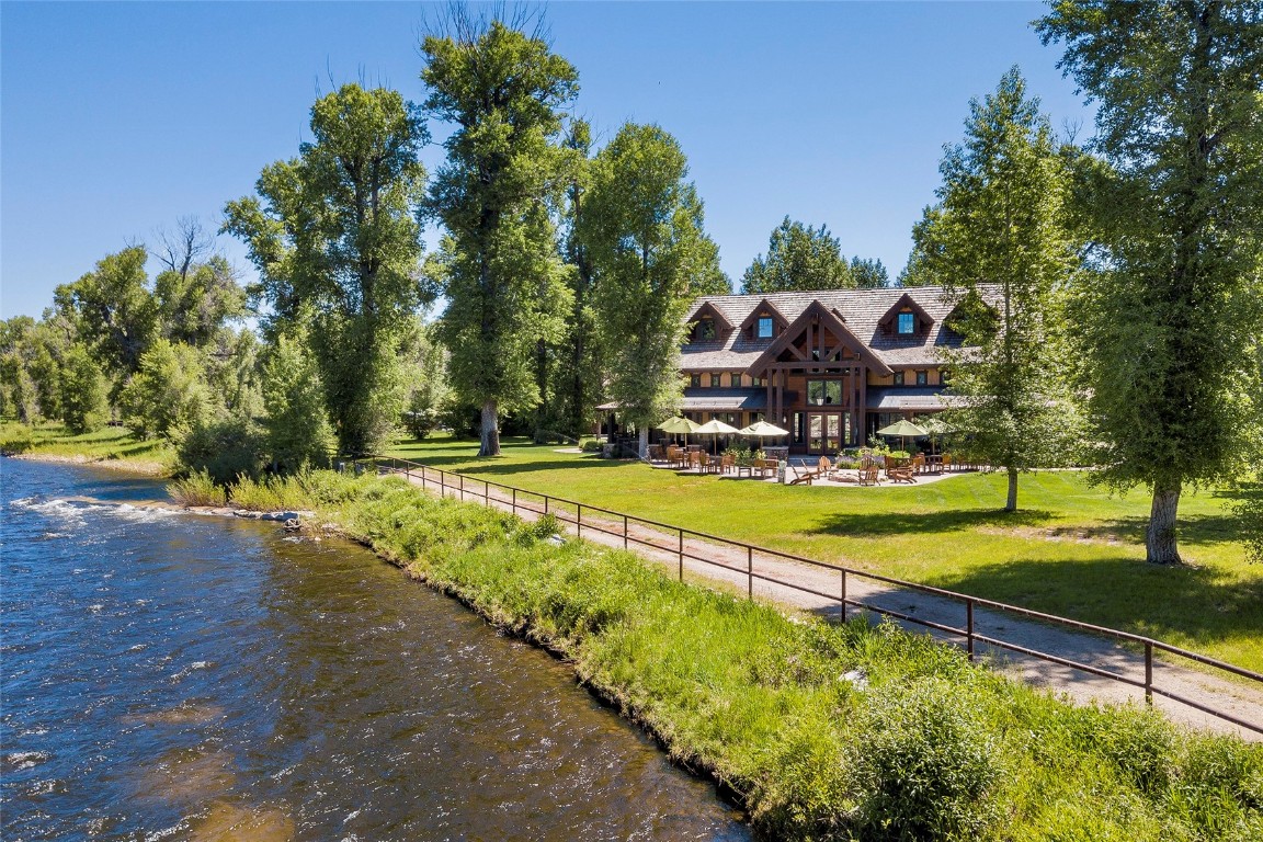 26705 Wild Iris Path Steamboat Springs, CO 80487 - Photo 7 of 17 a view of swimming pool with chairs and yard