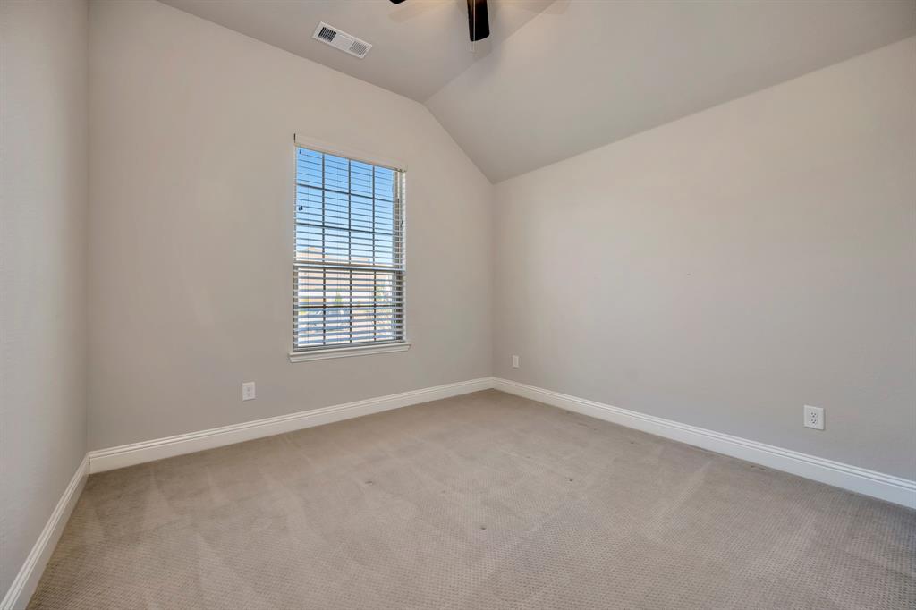 9820 Surveyor Road Little Elm, TX 75068 - Photo 22 of 40 an empty room with windows