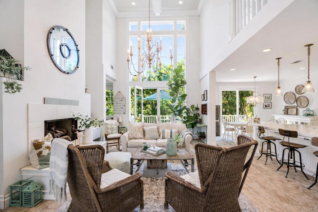 162 Jupiter Street Encinitas, CA 92024 - Photo 2 of 31 a living room with fireplace furniture and a large window