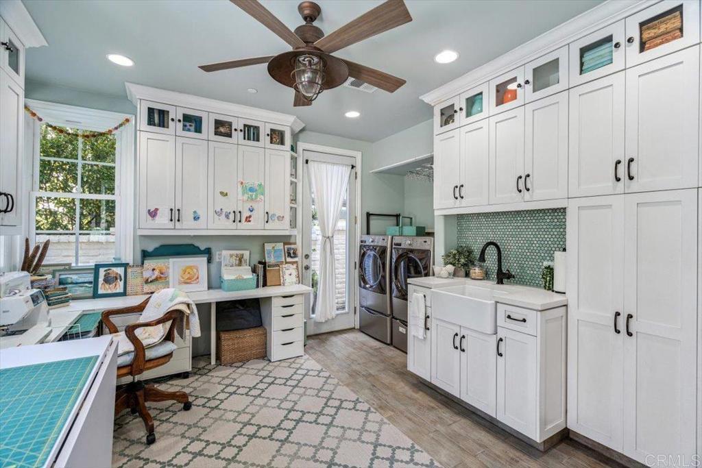 162 Jupiter Street Encinitas, CA 92024 - Photo 24 of 31 a kitchen with a stove a refrigerator and a sink