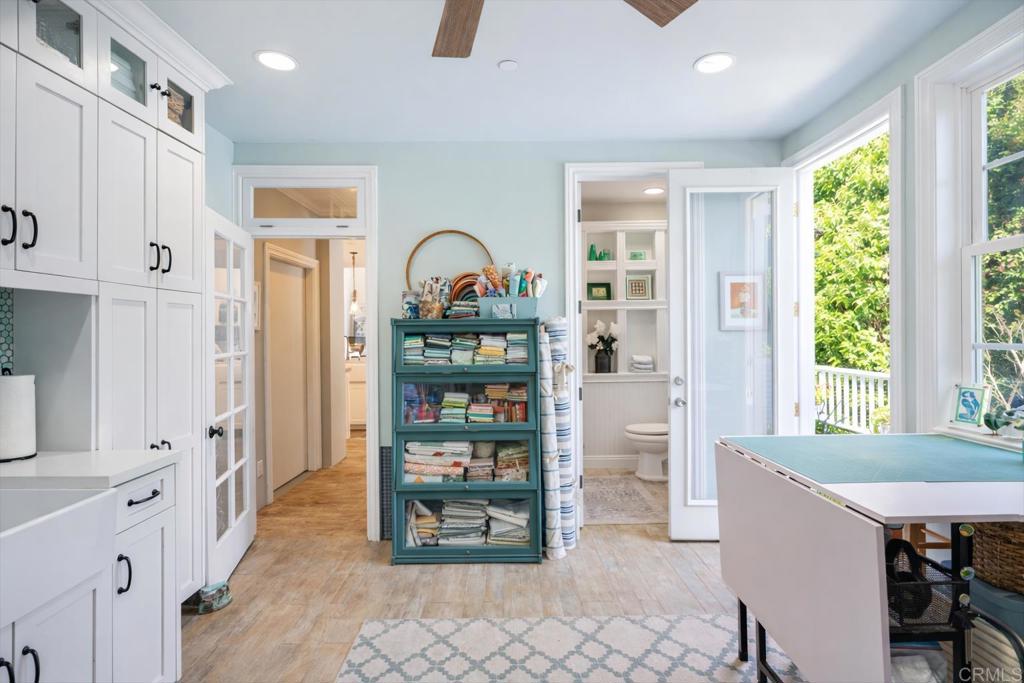 162 Jupiter Street Encinitas, CA 92024 - Photo 25 of 31 a open kitchen with stainless steel appliances granite countertop a refrigerator and a sink