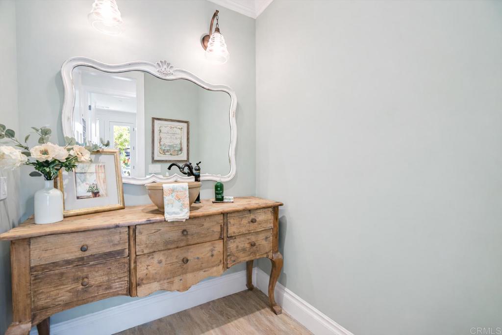 162 Jupiter Street Encinitas, CA 92024 - Photo 10 of 31 a bathroom with a sink and a mirror