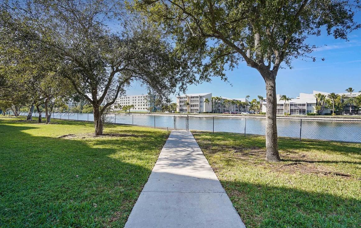 8260 Southwest 210th Street, Unit 302 Cutler Bay, FL 33189 - Photo 33 of 42 a view of park with large trees